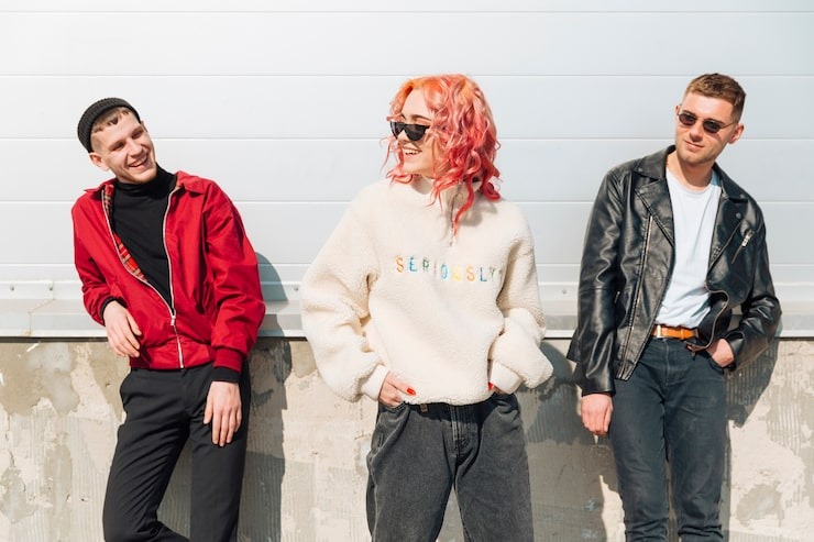 young-men-looking-woman-standing